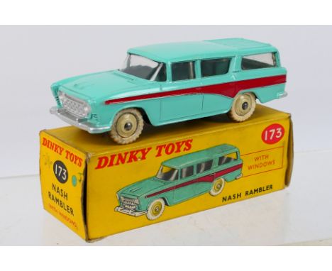 Dinky - A boxed Nash Rambler in turquoise # 173. The car appears in Near Mint condition with original white tyres. The box is