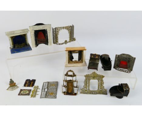 Doll Furniture - A collection of vintage dolls house accessories including fire places, coal scuttles and a shelving unit. Mo