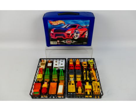 Matchbox - Hot Wheels - A plastic Hot Wheels carry case containing 24 Matchbox diecast model cars mainly Superfast. Cars incl