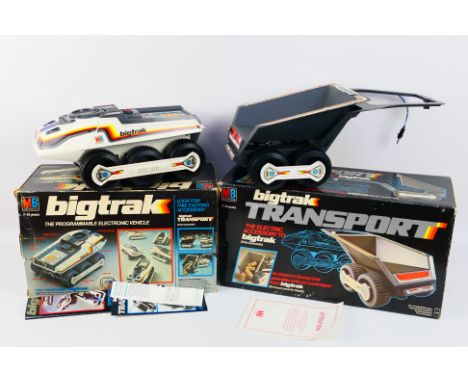 MB Games - A boxed vintage MB Games 'Big-Trak' with a boxed MB Games 'Big-Trak Transport' accessory. Both items show signs of