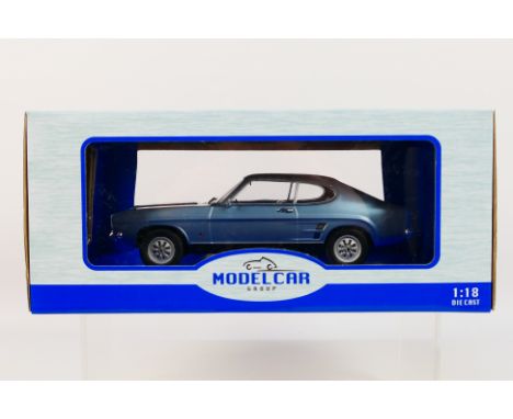 Model Car Group - A boxed 1:18 scale Model Car Group MCG18084 Ford Capri Mk.I 1973. The model in metallic blue appears to be 