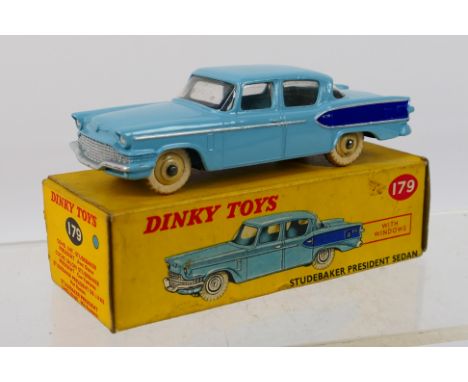 Dinky - A boxed Studebaker President sedan in blue # 179. The car appears in Near Mint condition with original white tyres an