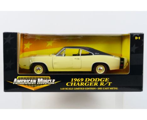 Ertl - A boxed 1:18 scale Limited Edition Ertl 'American Miuscle' #726062 1969 Dodge Charger R/T. The model in cream with bla