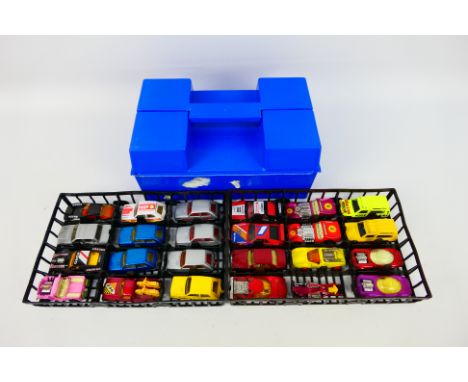 Matchbox - A plastic Matchbox carry case containing 24 Matchbox diecast model cars from various series. Cars include Superfas