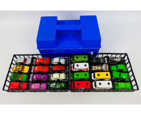 Matchbox - A plastic Matchbox carry case containing 24 Matchbox diecast model cars from various series. Cars include Matchbox