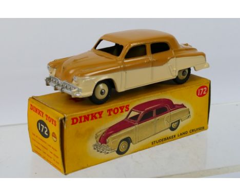 Dinky - A boxed Studebaker Land Cruiser sedan in tan over beige # 172. The car appears in Near Mint condition with original w