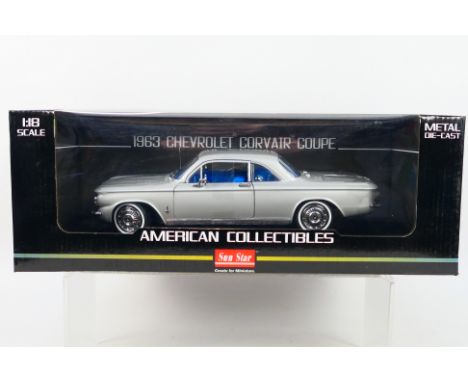 Sun Star - A boxed 1:18 scale Sun Star #1486 'American Collectibles' 1963 Chevrolet Corvair Coupe. The model in satin silver 