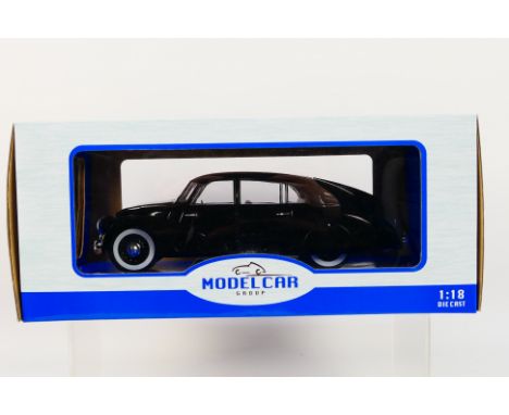 Model Car Group - A boxed 1:18 scale Model Car Group Tatra 87. The model in black appears to be in Mint condition, housed wit