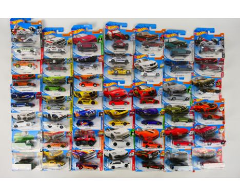 Hot Wheels - A carded collection of 47 Hot Wheels diecast model vehicles from various ranges. Lot includes 2005 Ford Mustang 