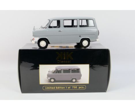 KK Scale - A limited edition Ford Transit Bus in 1:18 scale # KKDC180461. The van appears in Near Mint condition, the left re