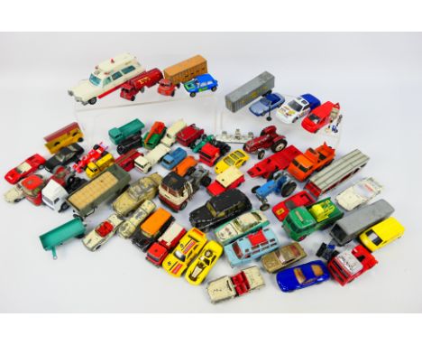 Dinky - Matchbox - Corgi - A collection in excess of 40 unboxed die-cast vehicles in varying sizes and a in worn condition to