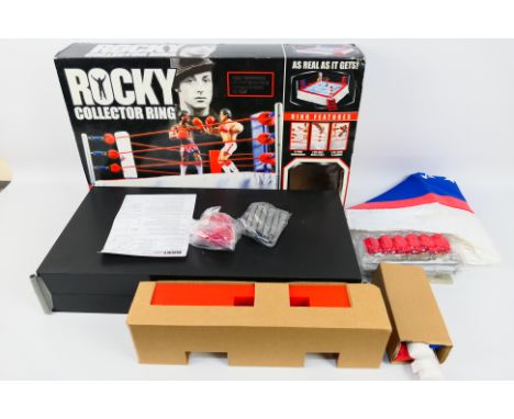 Jakks Pacific - A Jakks Pacific Rocky Collector Ring(79017). This item is in excellent condition and its contents appears to 