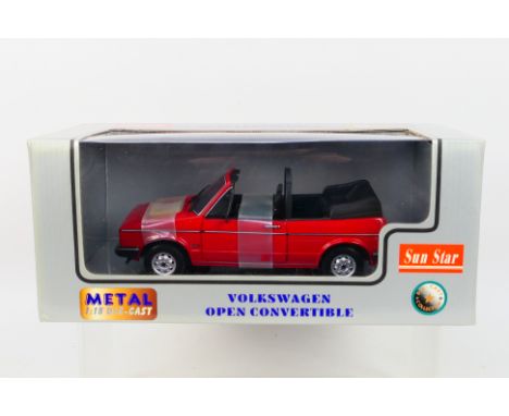 Sun Star - A boxed 1:18 scale Sun Star #727652 Volkswagen Open Convertible. The model in red appears to be in Mint condition,