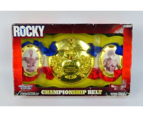 Jakks Pacific - A Jakks Pacific Rocky Championship Belt(79018) from the Rocky 2006 Range. This item appears to be in near-min