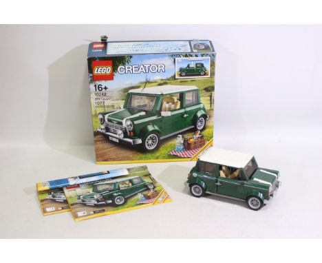 Lego - A boxed 2014 Lego 'Creator' #10242 Mini Cooper. The model is constructed, showing dusty signs of display, and may have