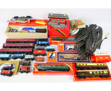 Hornby - Tri-ang - Lima - A mixed collection of boxed and unboxed OO gauge rolling stock, accessories and loose track. Lot in