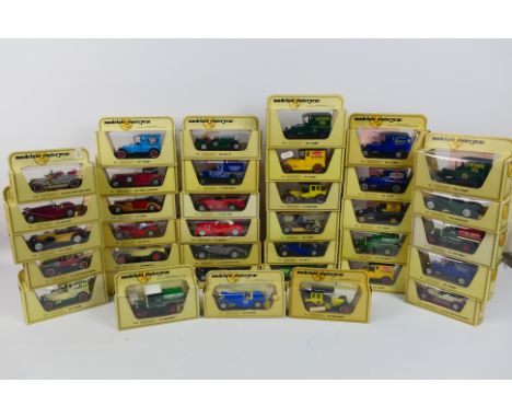Matchbox  Models of Yesteryear - Over 30 Matchbox Models of Yesteryear in straw window boxes, including some interesting vari