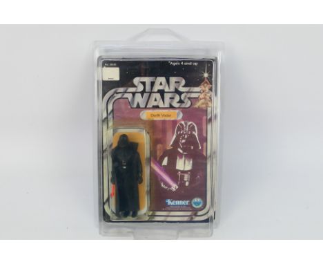 Star Wars - Kenner - A carded Star Wars 3.75" action figure 'Darth Vader'. The figure COO is marked GMFGI, 1977 with blank ra
