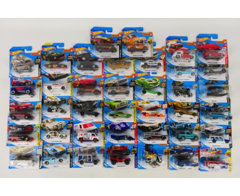 Hot Wheels - A carded collection of 39 Hot Wheels diecast model vehicles. Lot includes Gulf Ford GT40(HW Raceday); '70 Ford E