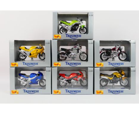 Maisto - Seven boxed Maisto 1:18 scale diecast Triumph motorcycles. Lot includes Sprint RS; TT600; Tiger and similar. Models 