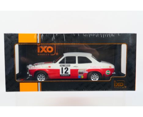 IXO Models - A boxed 1:18 scale IXO Models #18RMC024A Ford Escort Mk.I RS1600 #12 'H.Mikkola / G.Palm' RAC Rally 1971. The mo