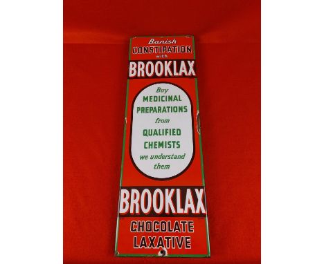 Brooklax Chemists enamel advertising sign. Mounted onto a wooden back 22.5 " hieght, 7.5" width.  