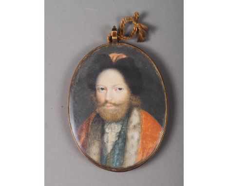 A late 17th century/early 18th century portrait miniature of a bearded gentleman in red jacket with ermine collar and fur hat
