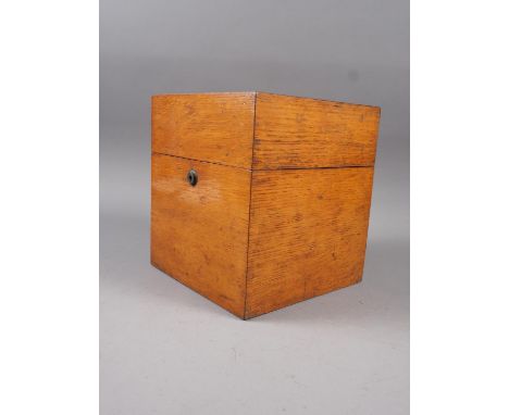 A four-section oak cased decanter box, 8" square, two cut glass decanters and two silver decanter labels