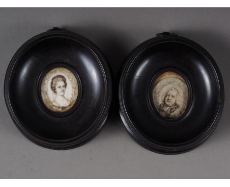 A pair of mid 18th century sepia portrait miniatures, inscribed verso Dr Kenny Rector of Lochnagar? Fermanagh? and his wife, 