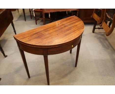 A 19th century mahogany box line inlaid semicircular double gate fold-over top card table, on square taper supports, 42" wide