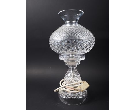 A Waterford "Inishmaan" two-piece hurricane lamp, 14" high overall 