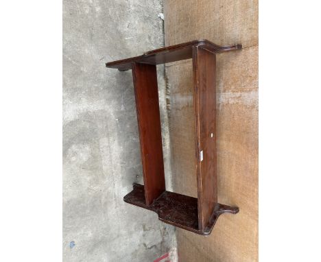 A MAHOGANY TWO TIER WALL SHELF
