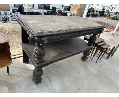 A VICTORIAN GOTHIC STYLE OAK TWO TIER BUFFET TABLE