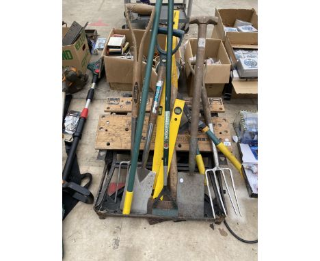 A FOLDING BLACK AND DECKER WORKMATE AND GARDEN TOOLS TO INCLUDE SPADES AND FORKS ETC