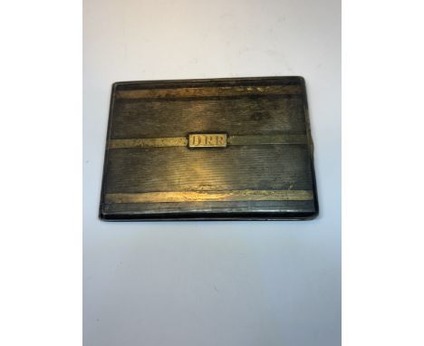 A MARKED STERLING SILVER AND 14 CARAT GOLD CIGARETTE CASE GROSS WEIGHT 140.9 GRAMS