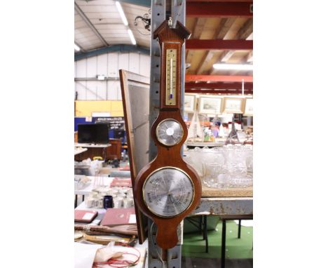 A WEATHERMASTER BAROMETER WITH THERMOMETER