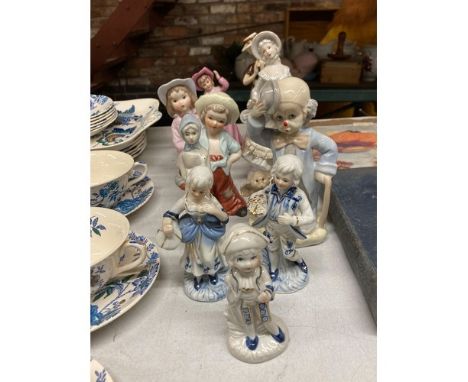 A COLLECTION OF CERAMIC AND PORCELAIN FIGURES