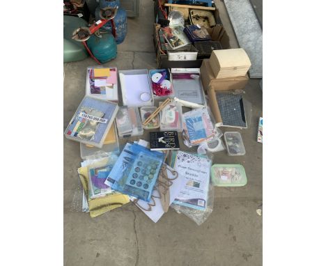 A LARGE ASSORTMENT OF VARIOUS CRAFTING ITEMS TO INCLUDE CARD, EYELET TOOL AND RIBBON ETC