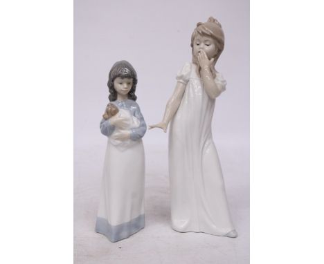 TWO NAO FIGURINES OFA GIRL HOLDING A PUPPY AND A GIRL YAWNING