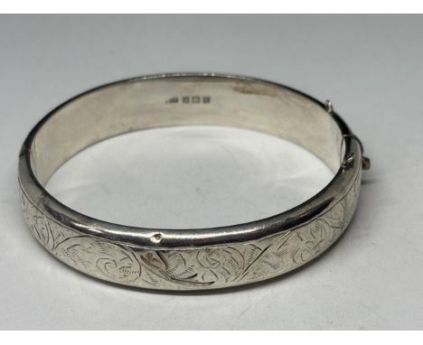 A HALLMARKED BIRMINGHAM SILVER BANGLE