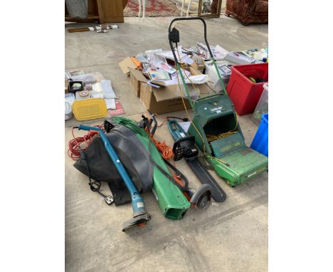 AN ASSORTMENT OF GARDEN TOOLS TO INCLUDE A MAKITA ELECTRIC CHAINSAW, A QUALCAST CONCORDE AND A LEAF VAC ETC