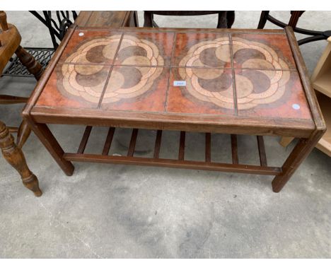 A RETRO TEAK TILED TOP COFFEE TABLE WITH MAGAZINE SHELF, 34" X 19"