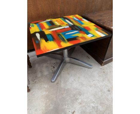 A RETRO, 23" SQUARE, LAMP TABLE WITH MULTI COLOURED ABSTRACT MELAMINE TOP ON ALLOY BASE
