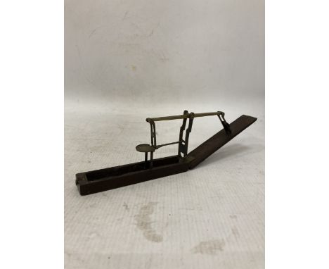 A MAHOGANY CASED SET OF BRASS FOLDING SOVERIEGN SCALES