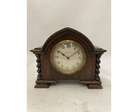 A RARE ANTIQUE FRENCH EIGHT DAY MANTLE CLOCK IN A SOLID WOOD CASE WITH BARLEY TWIST COLUMNS CIRCA 1910 - IN WORKING ORDER AT 