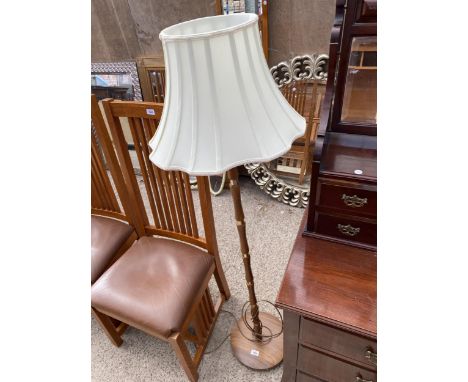 A RETRO TEAK STANDARD LAMP WITH SHADE