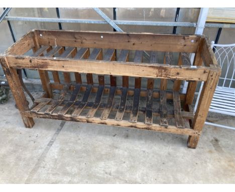 A VINTAGE WOODEN COTTON MILL STORAGE TABLE WITH LOWER SHELF