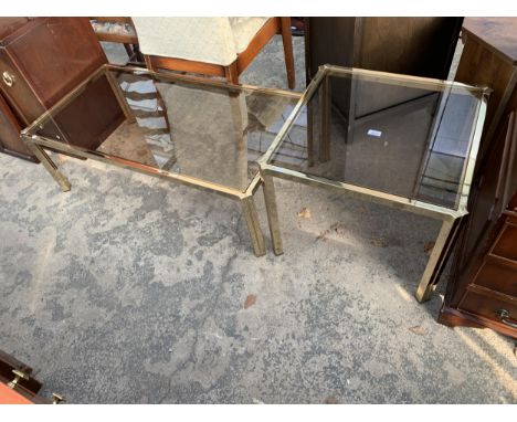 A GLASS TOP COFFEE TABLE AND MATCHING LAMP TABLE ON GOLD COLOURED METAL FRAMES