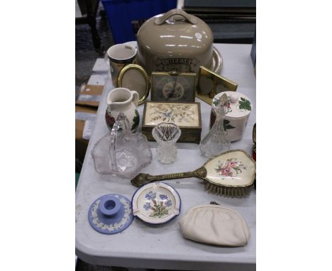 A LARGE VINTAGE CHEESE DOME AND PLATE TOGETHER WITH A WEDGWOOD JASPERWARE CANDLESTICK, PETIT POINT CLOCK, BRUSH AND JEWELLERY