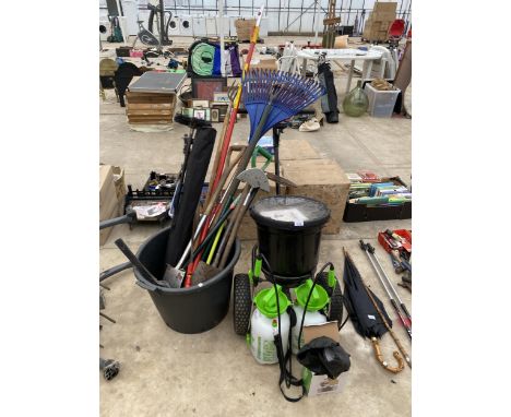 AN ASSORTMENT OF GARDEN TOOLS TO INCLUDE A HANDY SEEDER, SPRAYERS AND SPADES ETC